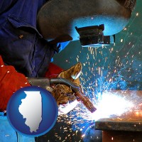 illinois an industrial welder wearing a welding helmet and safety gloves